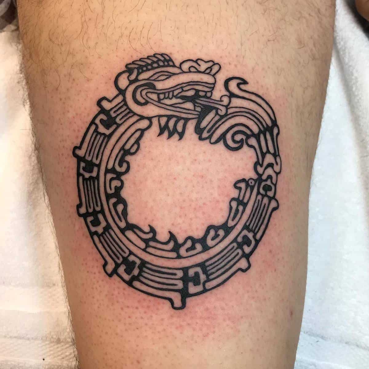 This Ouroboros Quetzalcoatl tattoo features bold, clean black lines, showcasing the feathered serpent devouring its tail