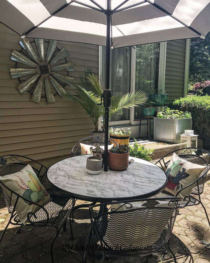 backyard outdoor table and chairs umbrella ferns