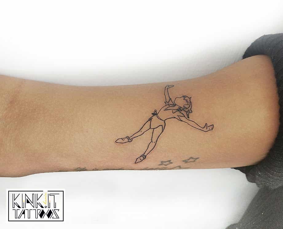 Minimalist fine-line tattoo of Peter Pan floating with arms outstretched, inked in black