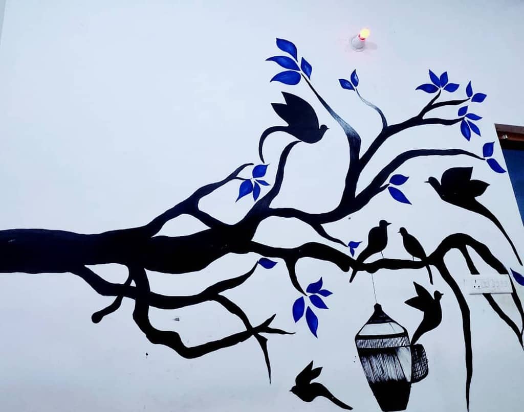 hand painted tree and birds wall mural
