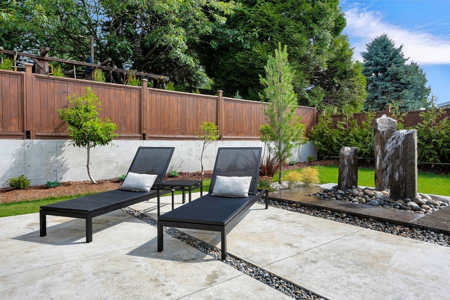 large stone paver patio in backyard