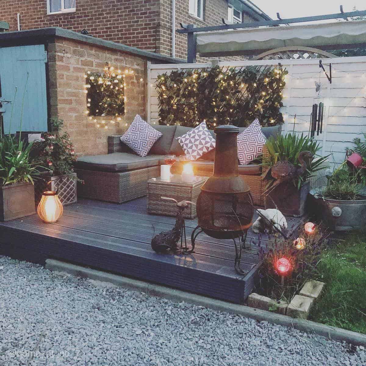 small wood deck patio with string lights