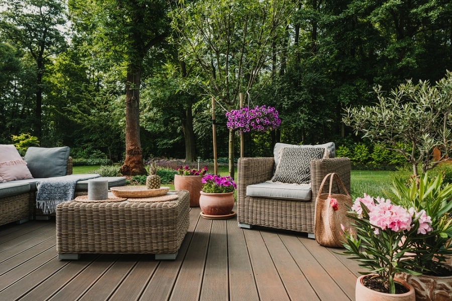 wood deck patio with wicker furniture