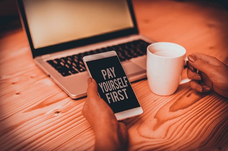 Pay yourself and your employees first - Successful businessman