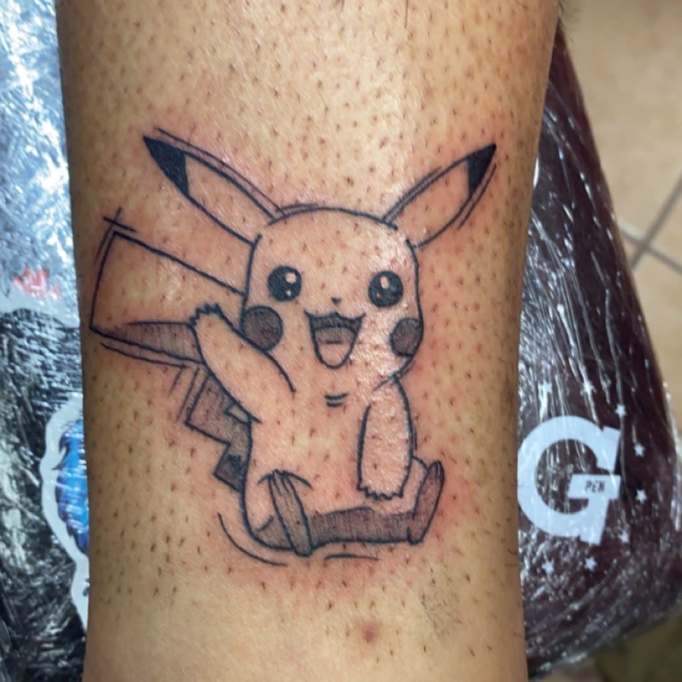 A fresh Pikachu tattoo on a leg