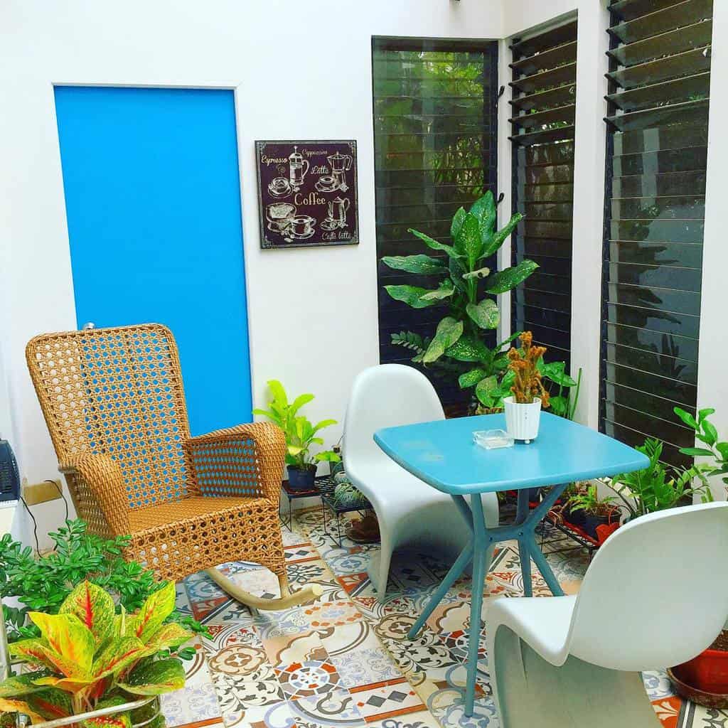 small pattern tile patio with accent rocking chair 