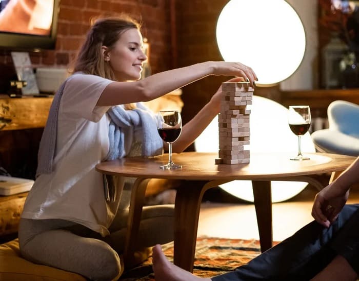 Man And Woman Playing Jenga
