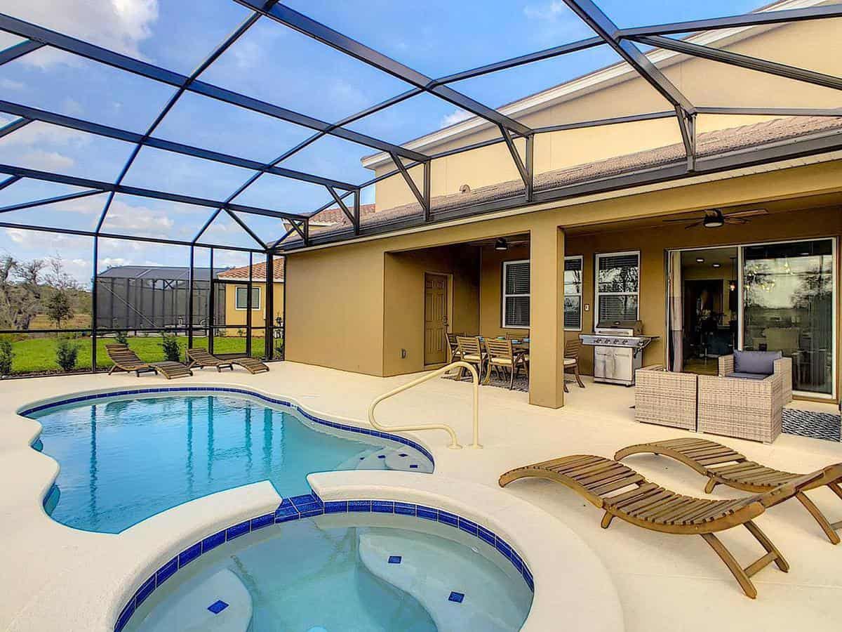 large curved glass pool patio enclosure 