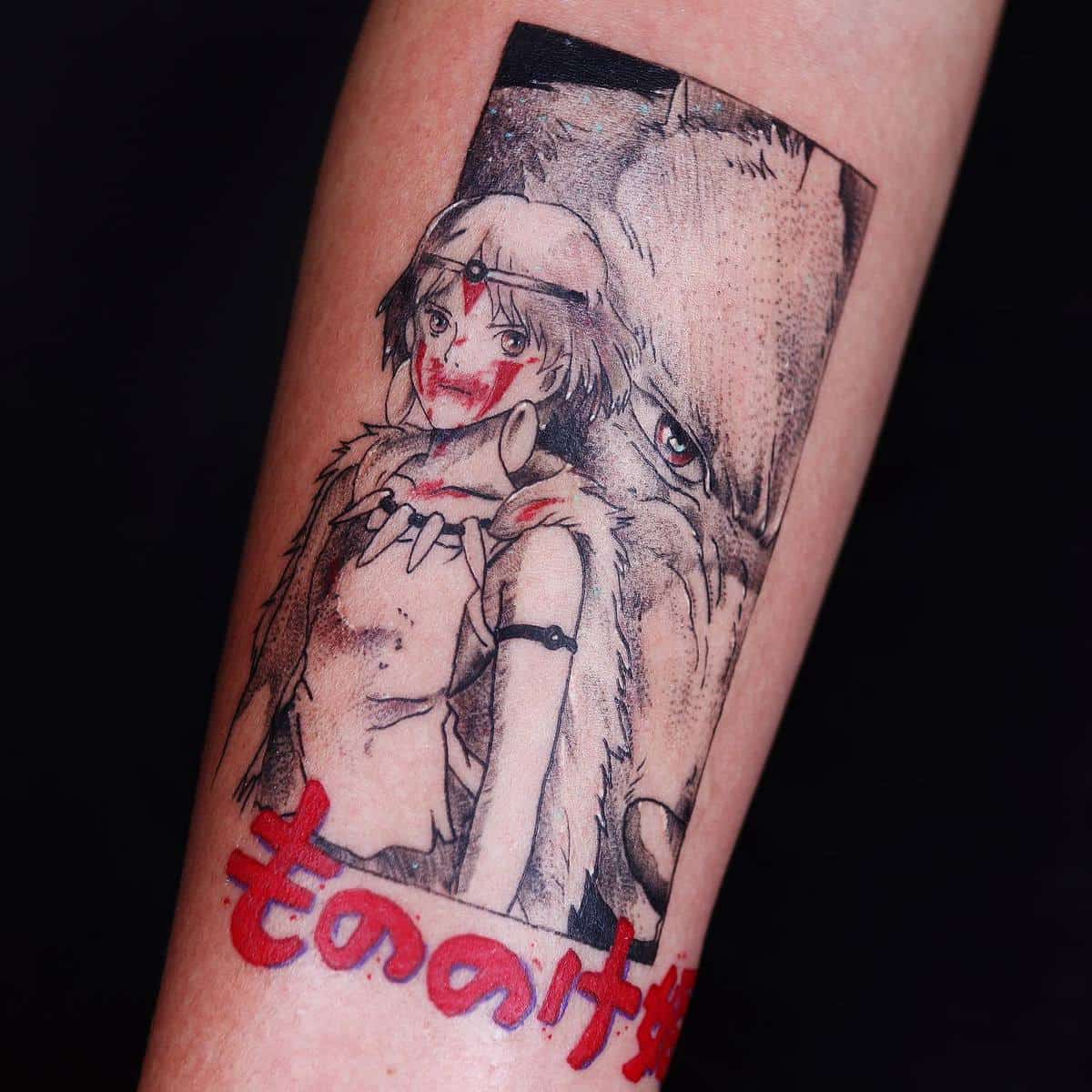 Colorful tattoo of San with Moro and the Princess Mononoke title in Japanese on the forearm