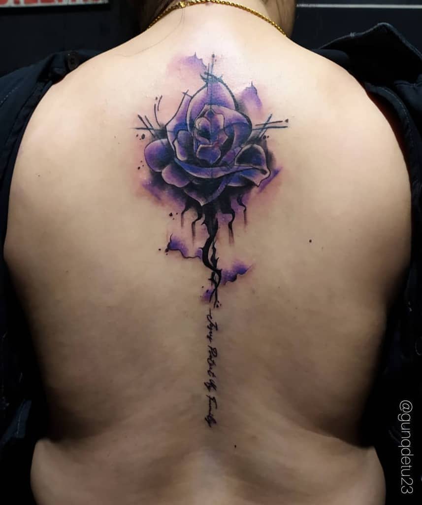 A purple and black abstract rose with a winding stem on the back