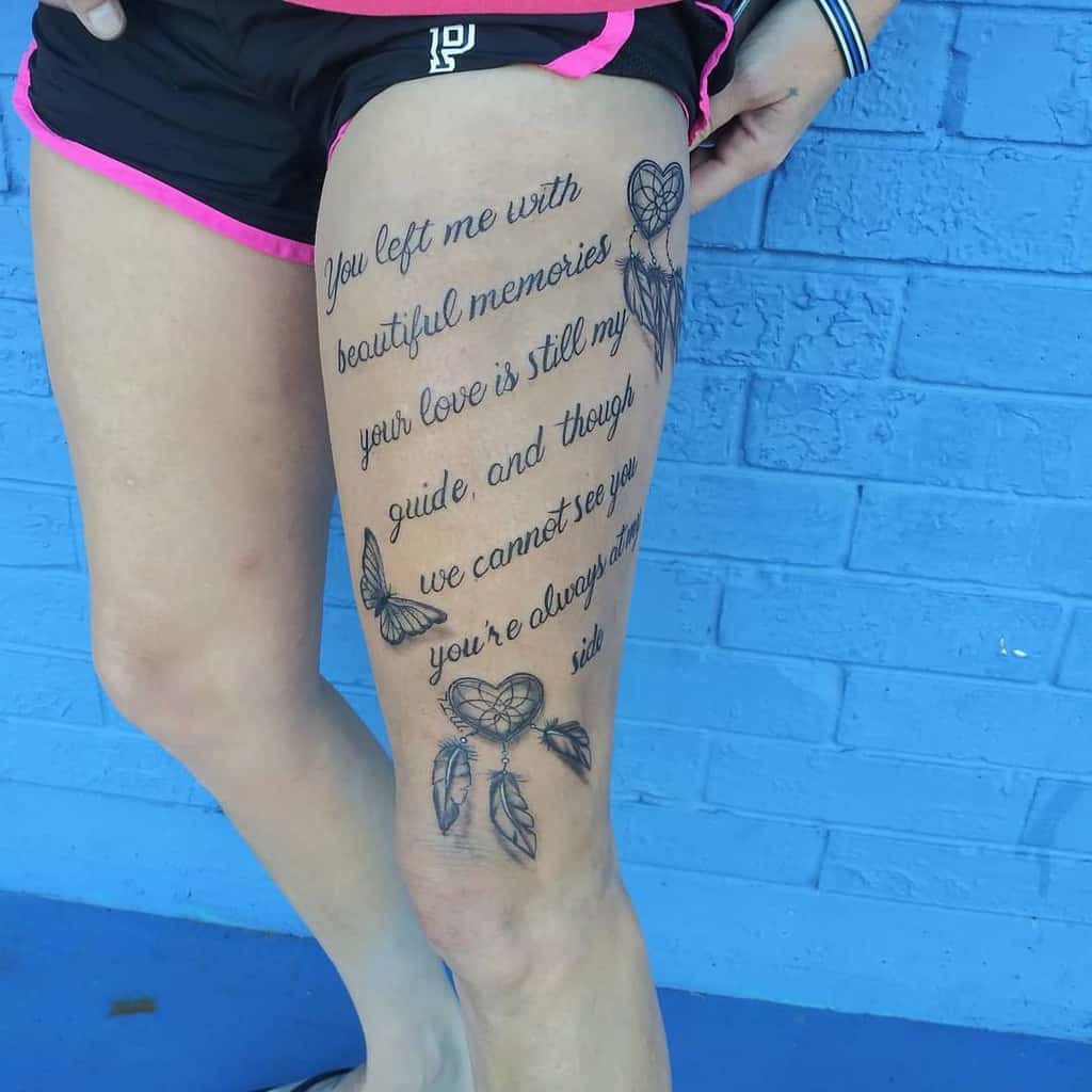 Close-up of a leg tattoo with a heartfelt quote and dreamcatcher designs