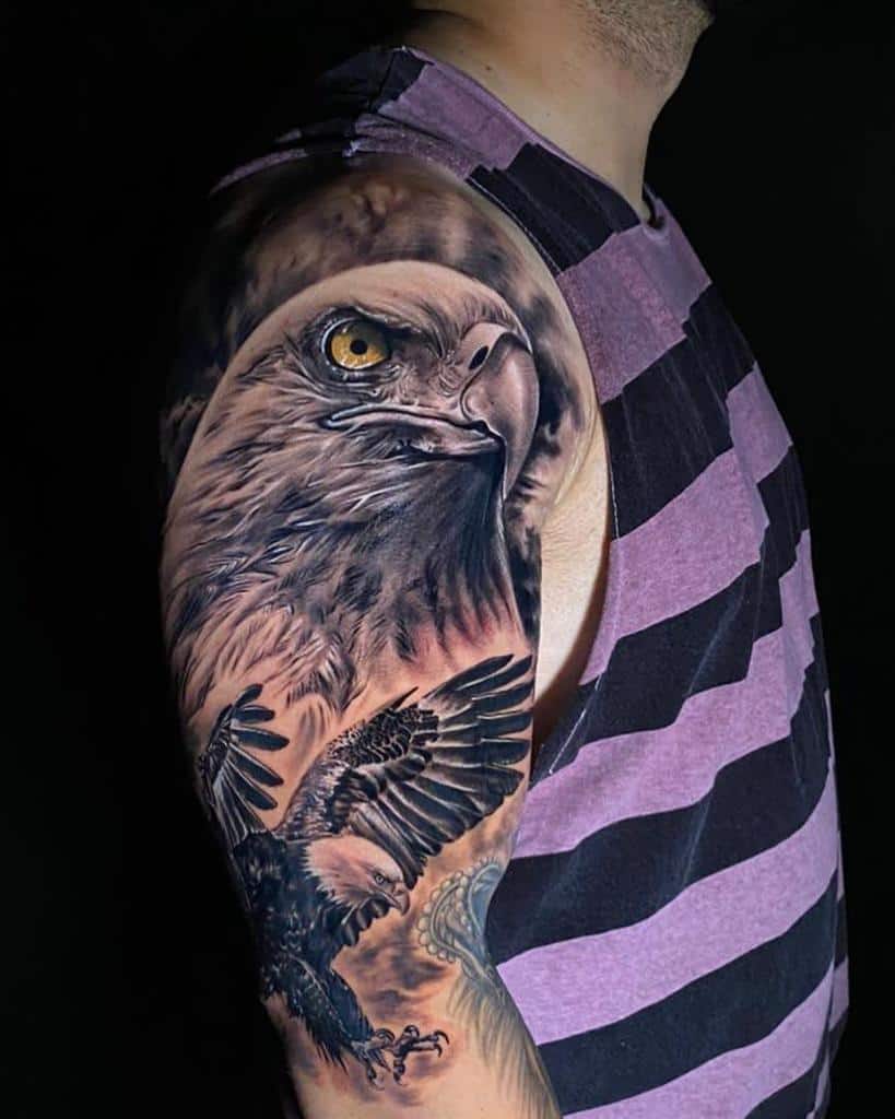 Man with a detailed eagle tattoo covering his upper arm