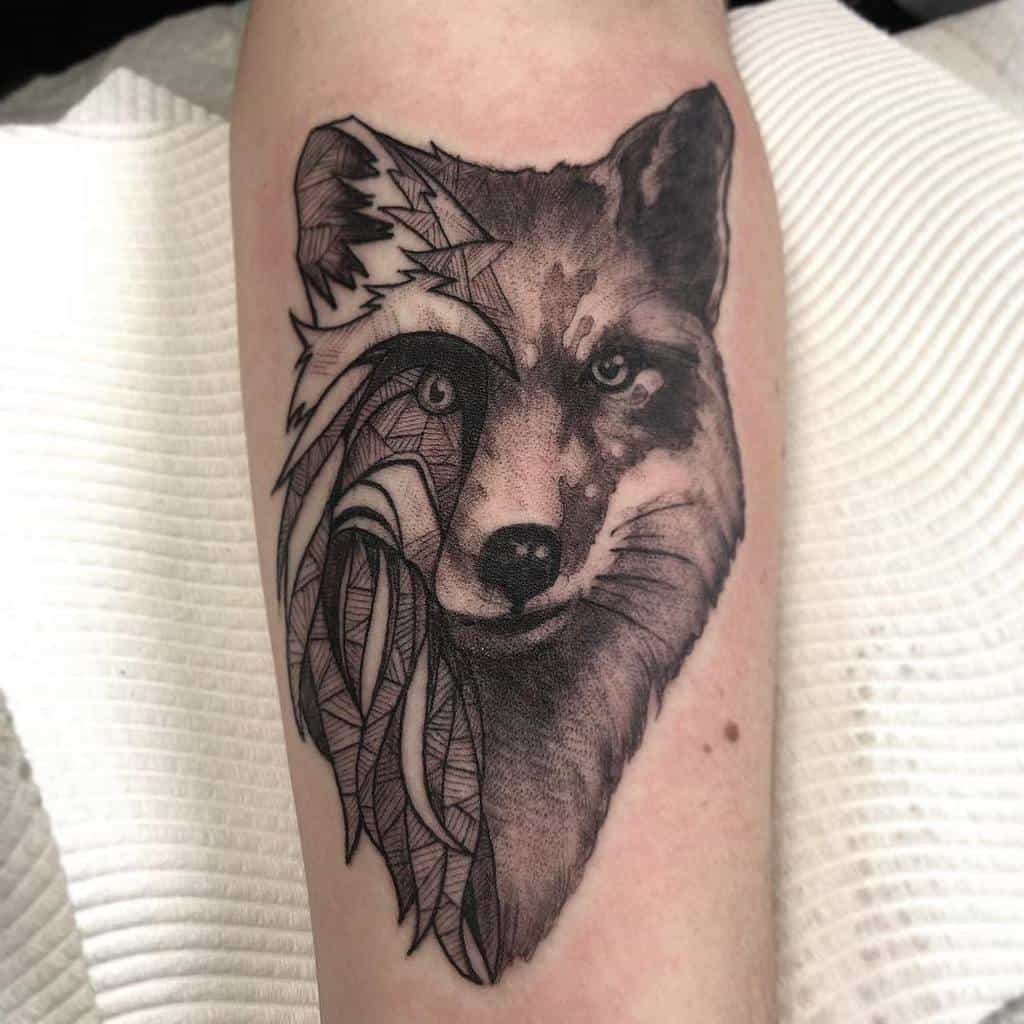 A fox tattoo combining realistic fur detailing with geometric patterns on one side, creating a unique contrast