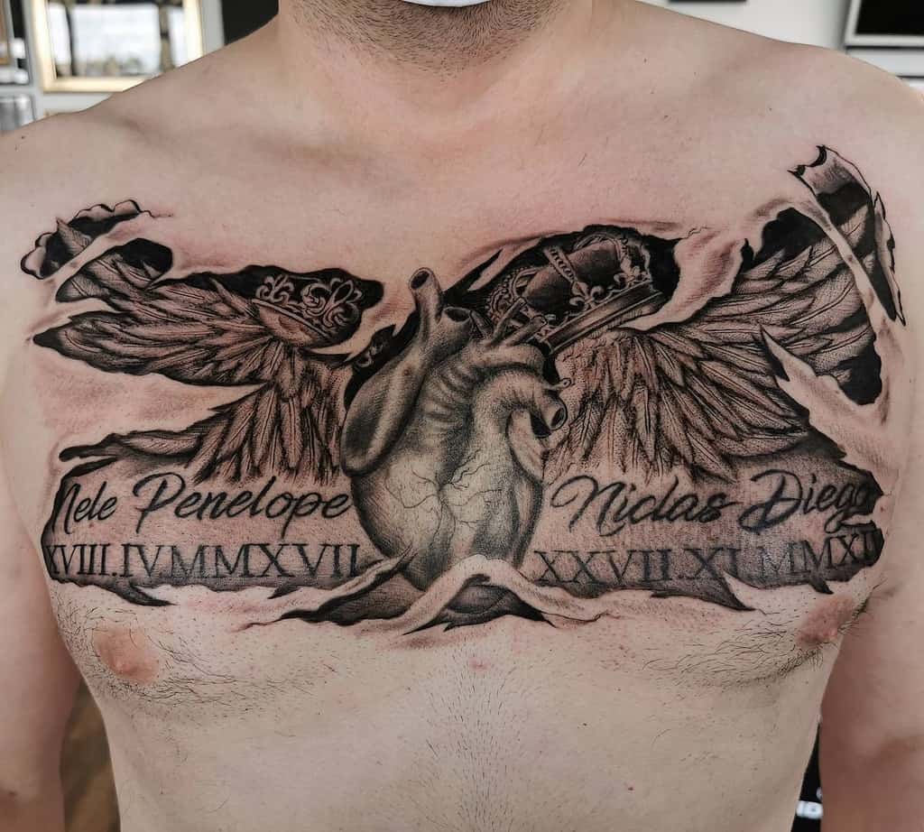 Black and grey tattoo of an anatomical heart with a crown and wings, torn skin effect, names 'Nele Penelope' and 'Niclas Diego' with Roman numerals