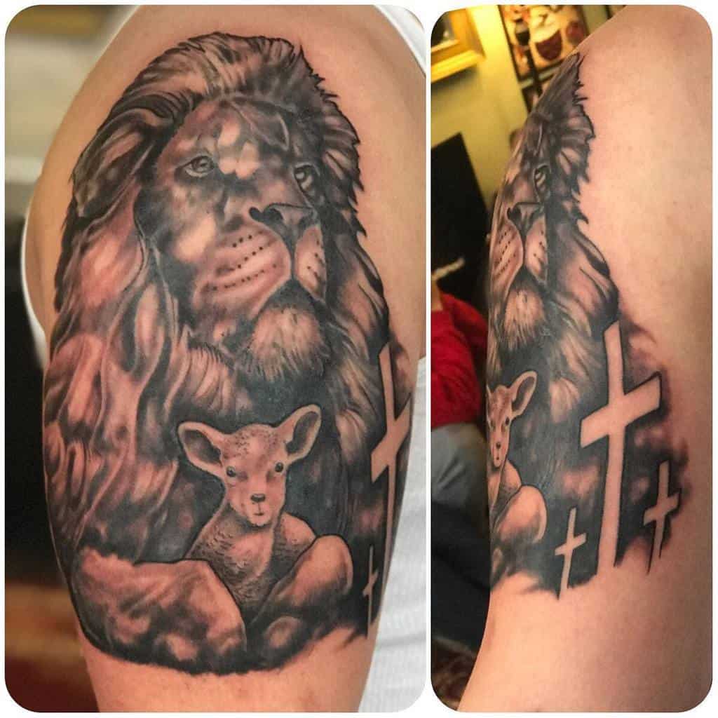 Tattoo of a lion, lamb, and two crosses on a person's upper arm