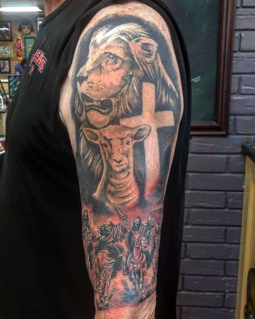 Tattoo of a lion, cross, and a lamb intertwined with the four horsemen of the apocalypse on a person's arm