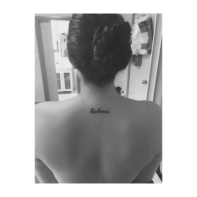 Cursive Resilience Tattoo