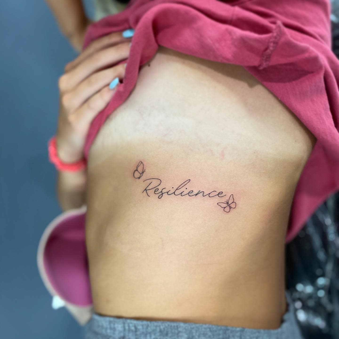 Rib Resilience Tattoo