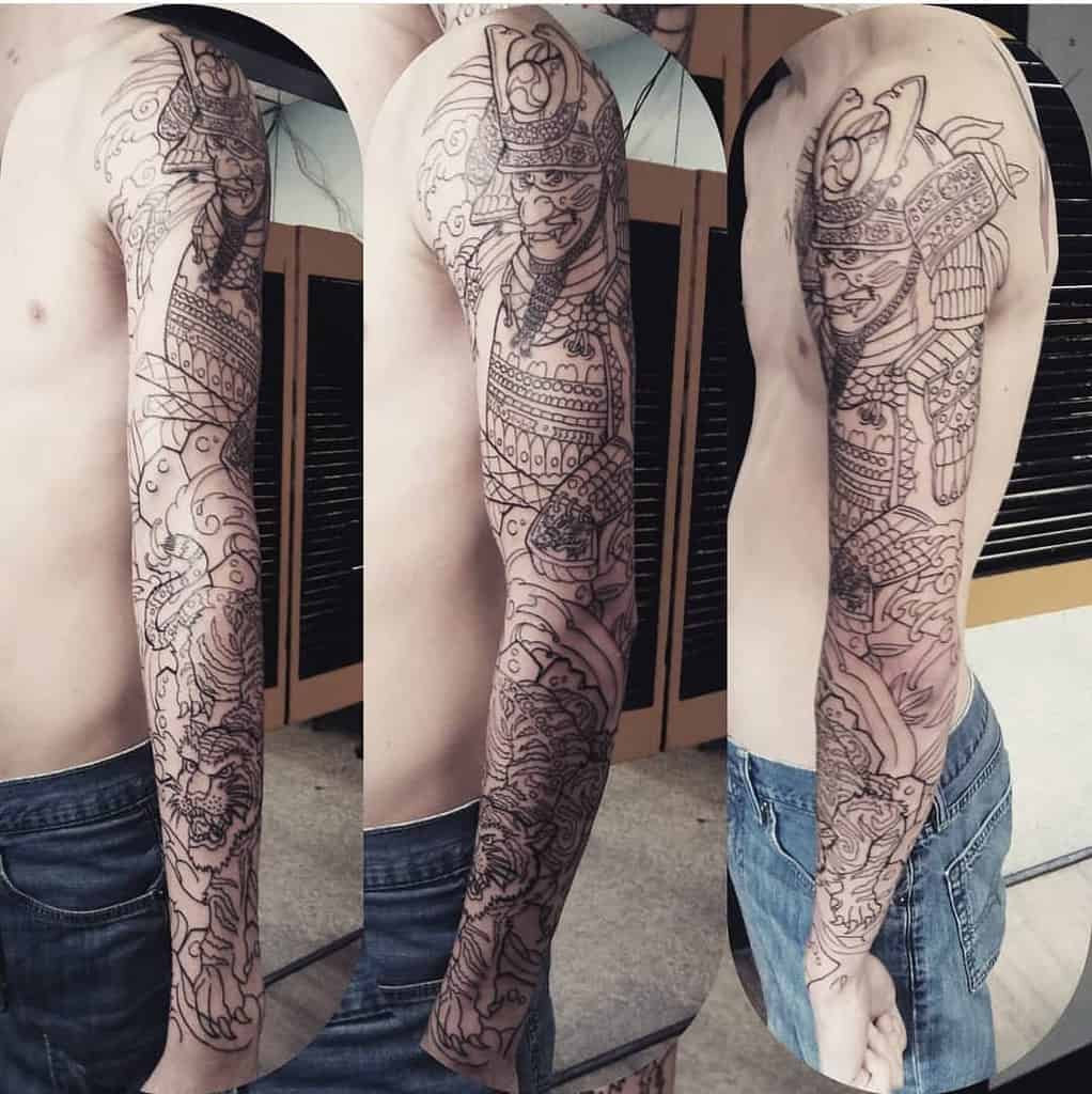 Full-sleeve tattoo outline featuring a samurai in traditional armor, intricate patterns, and a fierce tiger, ready for shading and detail