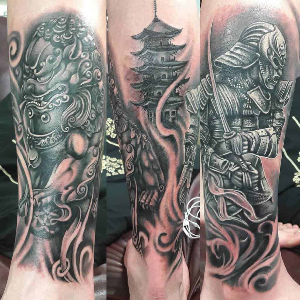 Stunning leg tattoo blends intricate Japanese elements, including a samurai, a pagoda, and a guardian lion, creating a harmonious design rich in cultural symbolism and artistic detail