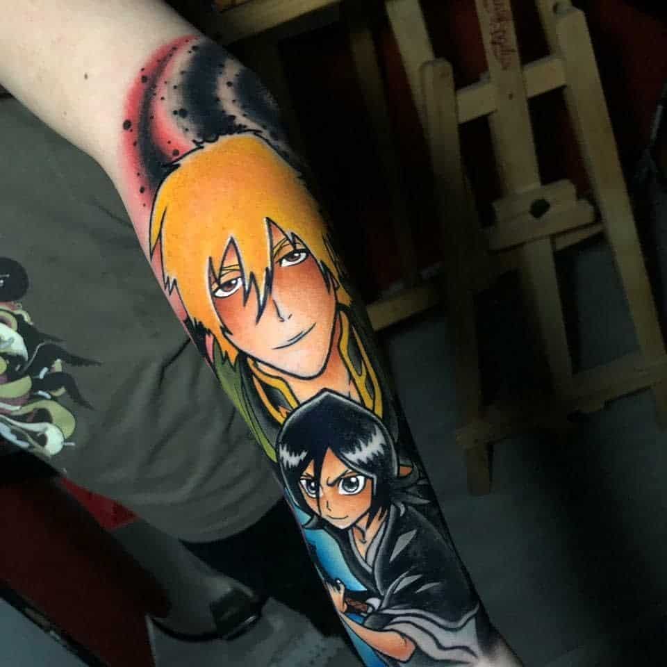 Vibrant color tattoo of Ichigo Kurosaki and Rukia Kuchiki from Bleach, featuring bold shading, fiery red accents, and dynamic poses
