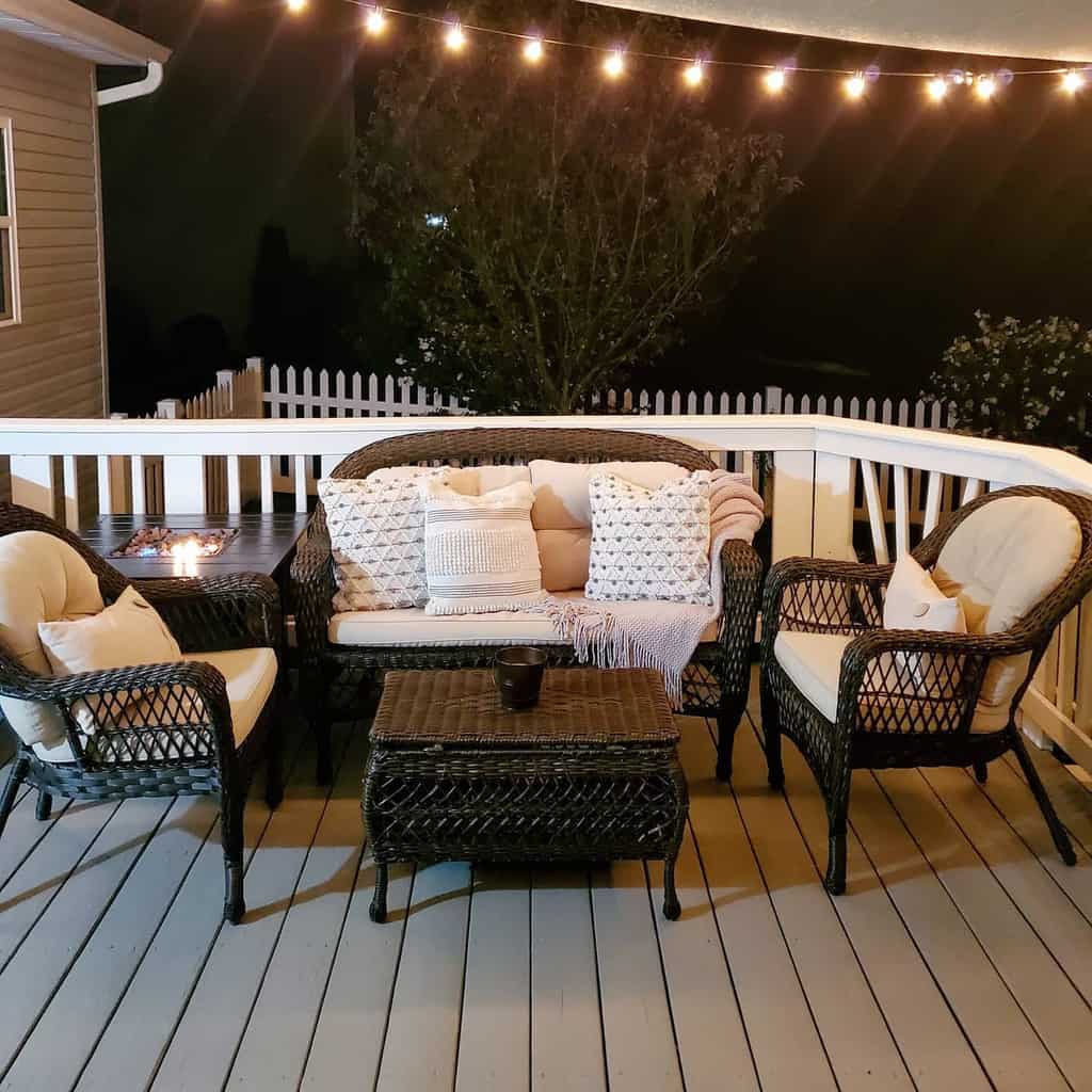 rustic wood deck black wicker furniture