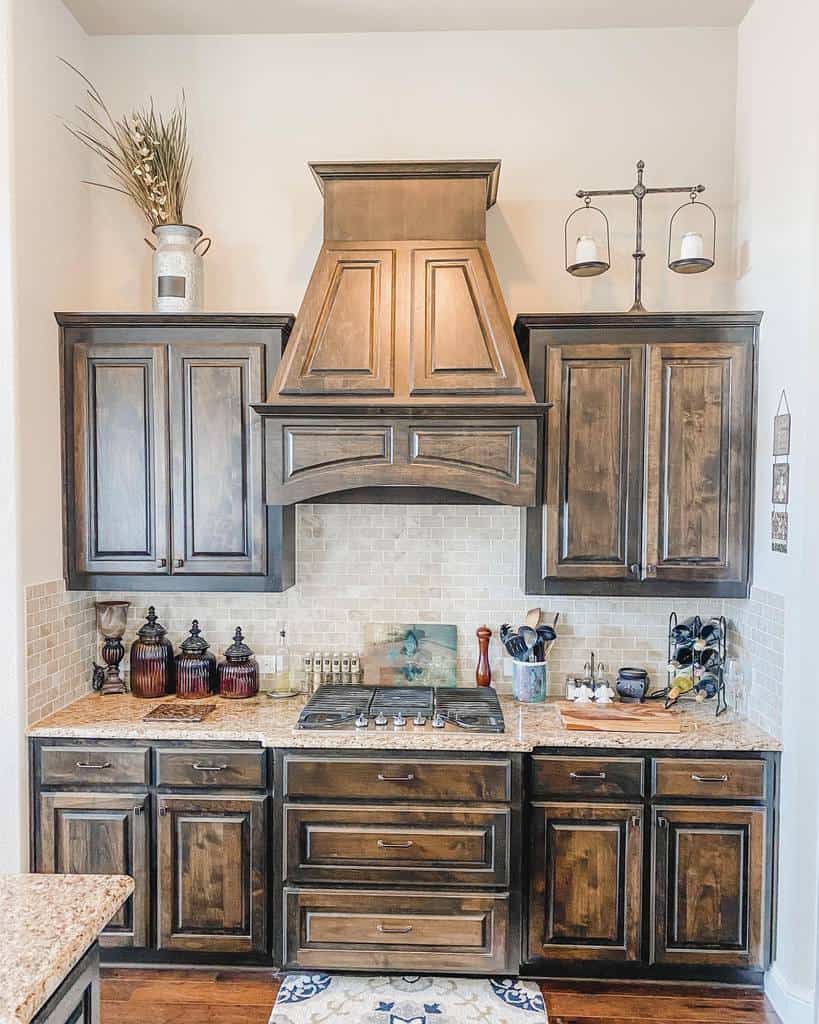 stained wood cabinets rustic kitchen gray tile backsplash