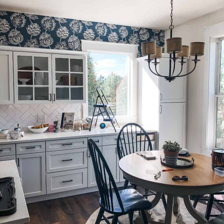 rustic white kitchen dining table and chairs vintage chandelier flower wallpaper