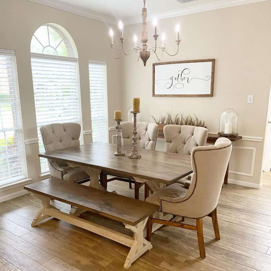 rustic dining room wood table and chairs candlesticks chandelier