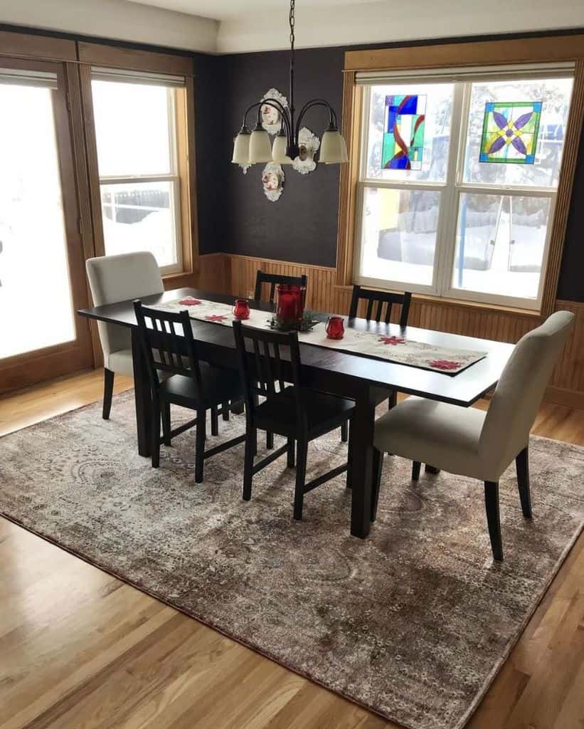 small dining room long table and chairs floor rug pendant chandelier