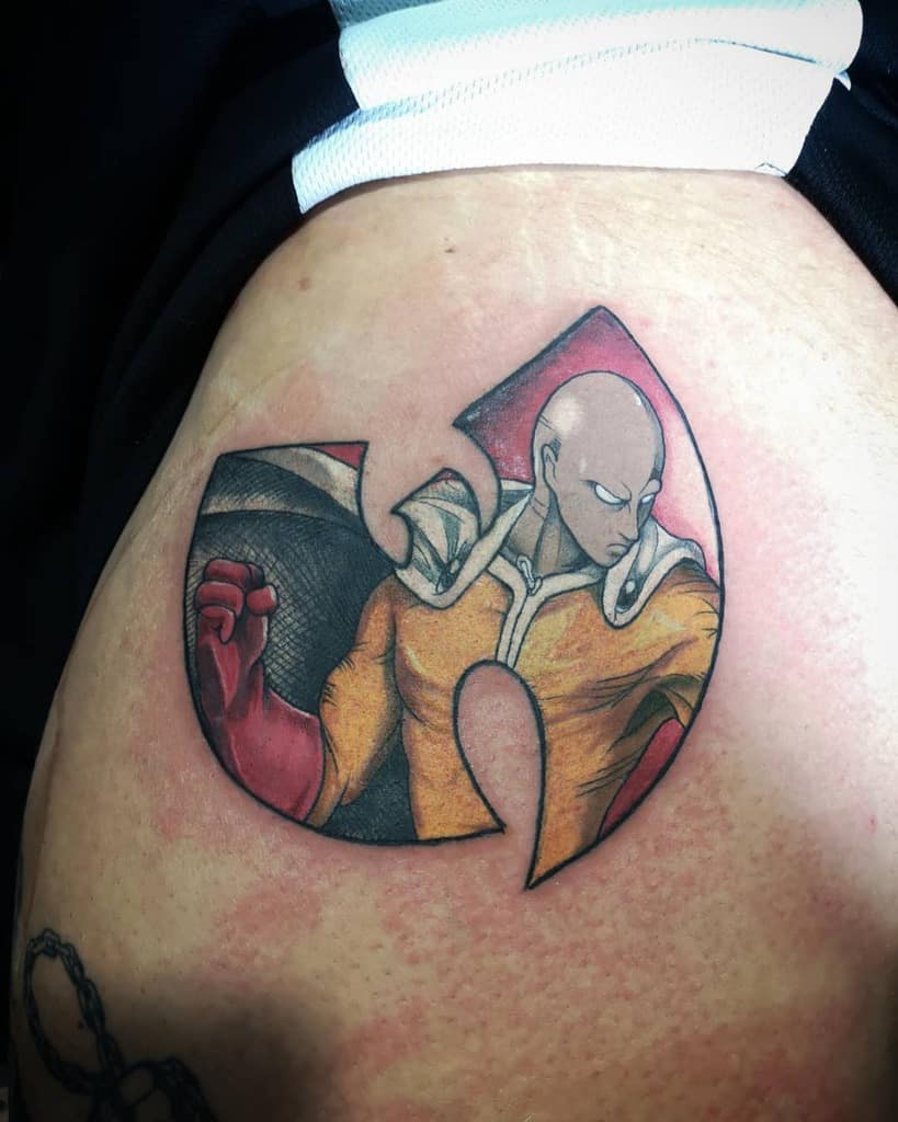 A colorful tattoo of Saitama from One Punch Man inside the Wu-Tang Clan logo, blending anime and hip-hop culture in a unique design
