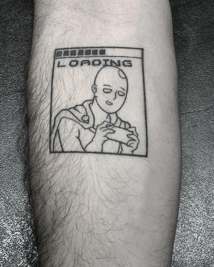 A minimalist black ink tattoo of Saitama from One Punch Man playing a handheld console, with a "LOADING" bar above him in a pixelated style