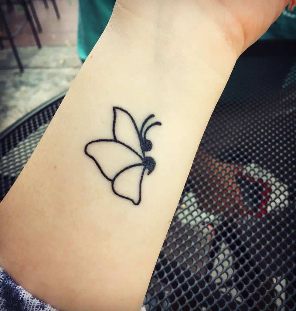 Minimalistic semicolon butterfly tattoo symbolizing resilience, mental health struggles, and hope through simple line work