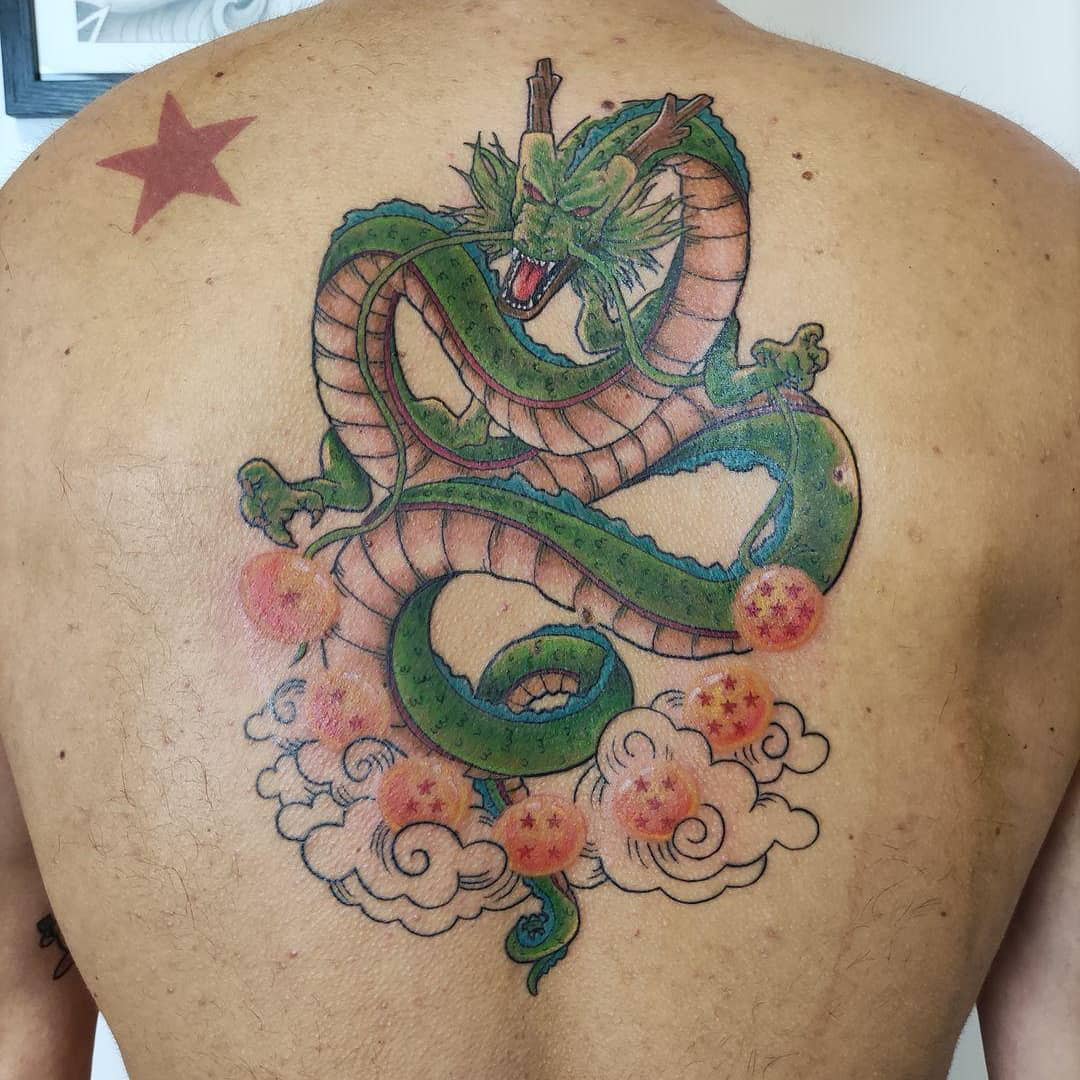 Shenron tattoo on the back, showing the iconic dragon with Dragon Balls and clouds