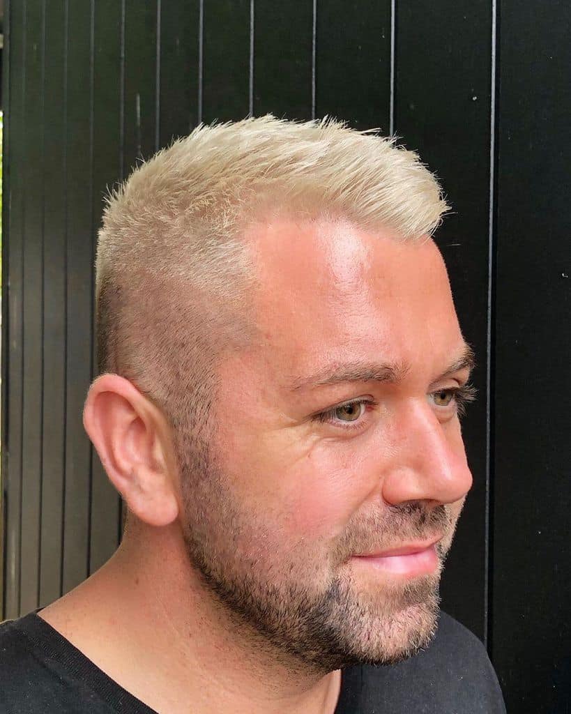 Short Blond Haircut With Messy Tresses On Top