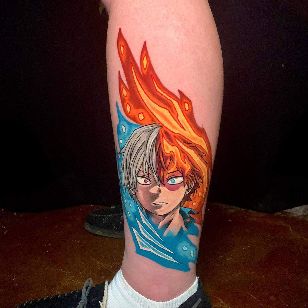 Vibrant tattoo of Shoto Todoroki from My Hero Academia, with striking fire and ice effects, highlighting his dual elemental abilities