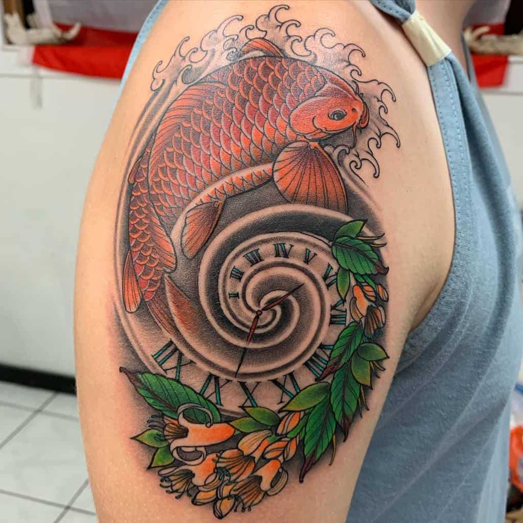 Vibrant shoulder tattoo featuring a koi fish swimming around a clock spiral, adorned with honeysuckle flowers