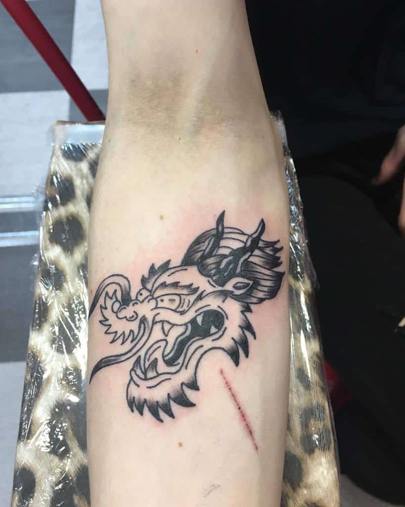 Simple Dragon Tattoo for Men jason_hampstead