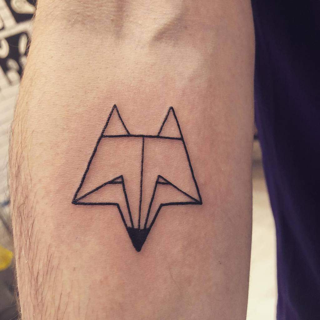 Geometric fox tattoo on forearm