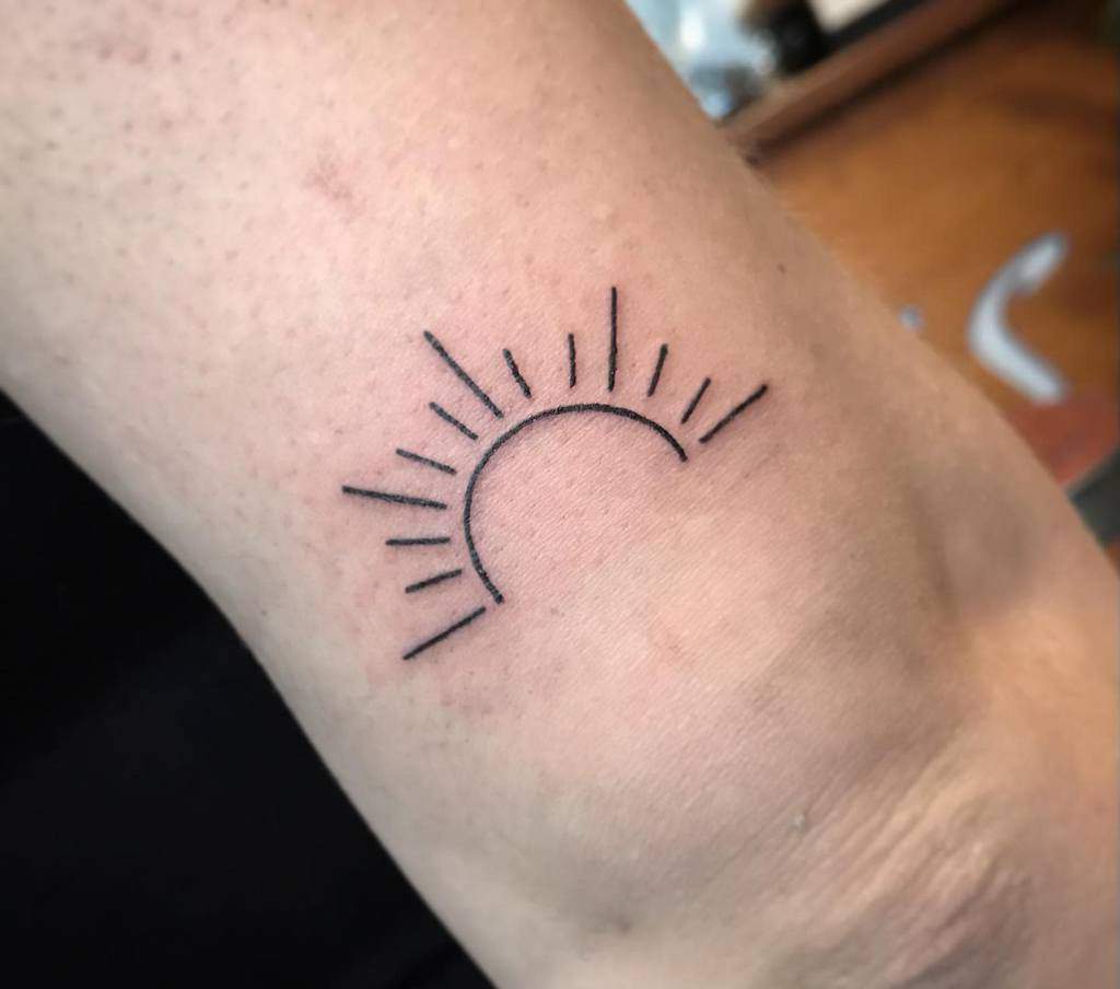 Simple Rising Sun Upperarm Tattoo