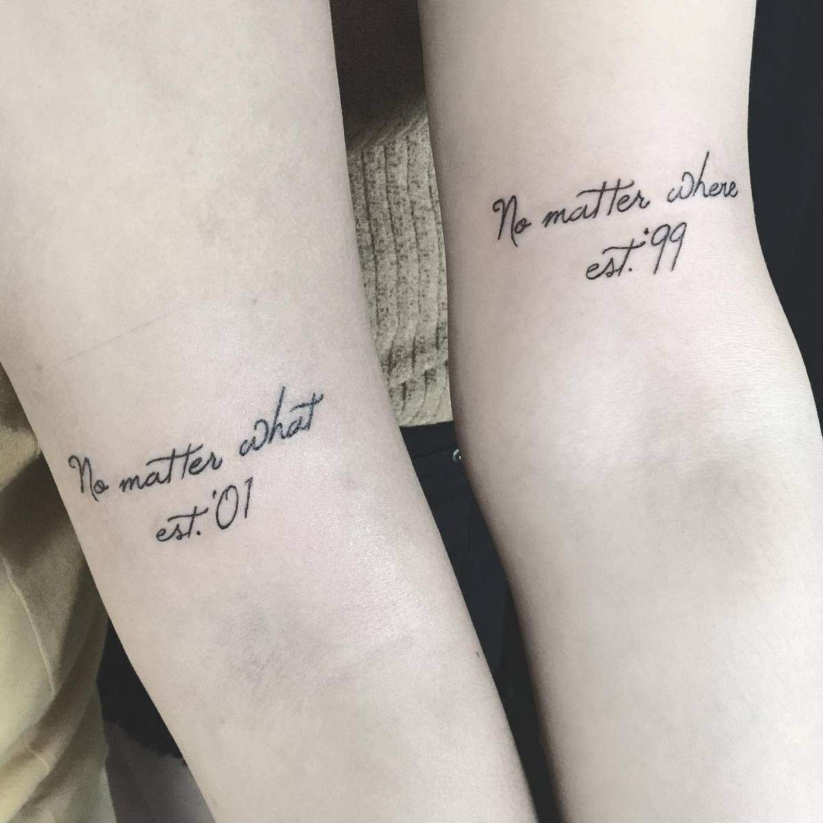 No matter what est 01" tattoo on one leg and "No matter where est 99" tattoo on the other leg