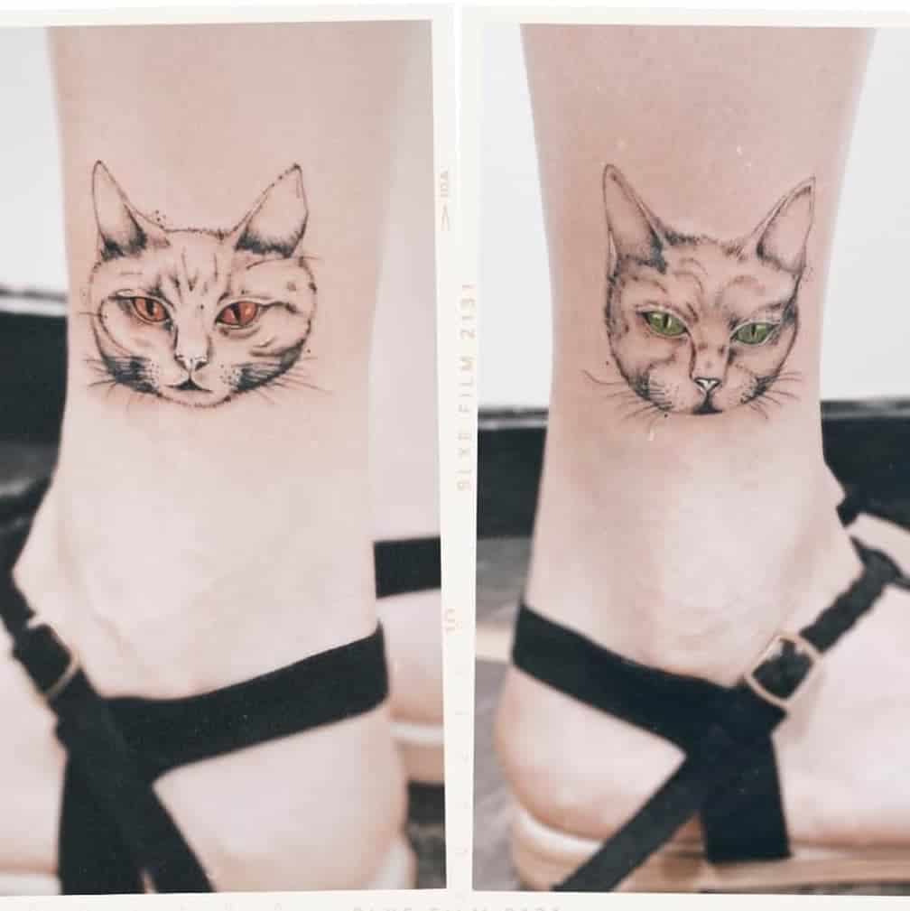 Two cat face tattoos on ankles, one with red eyes and one with green eyes