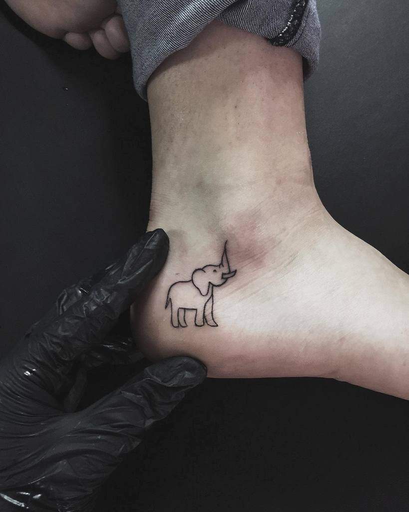 Simple elephant tattoo on an ankle