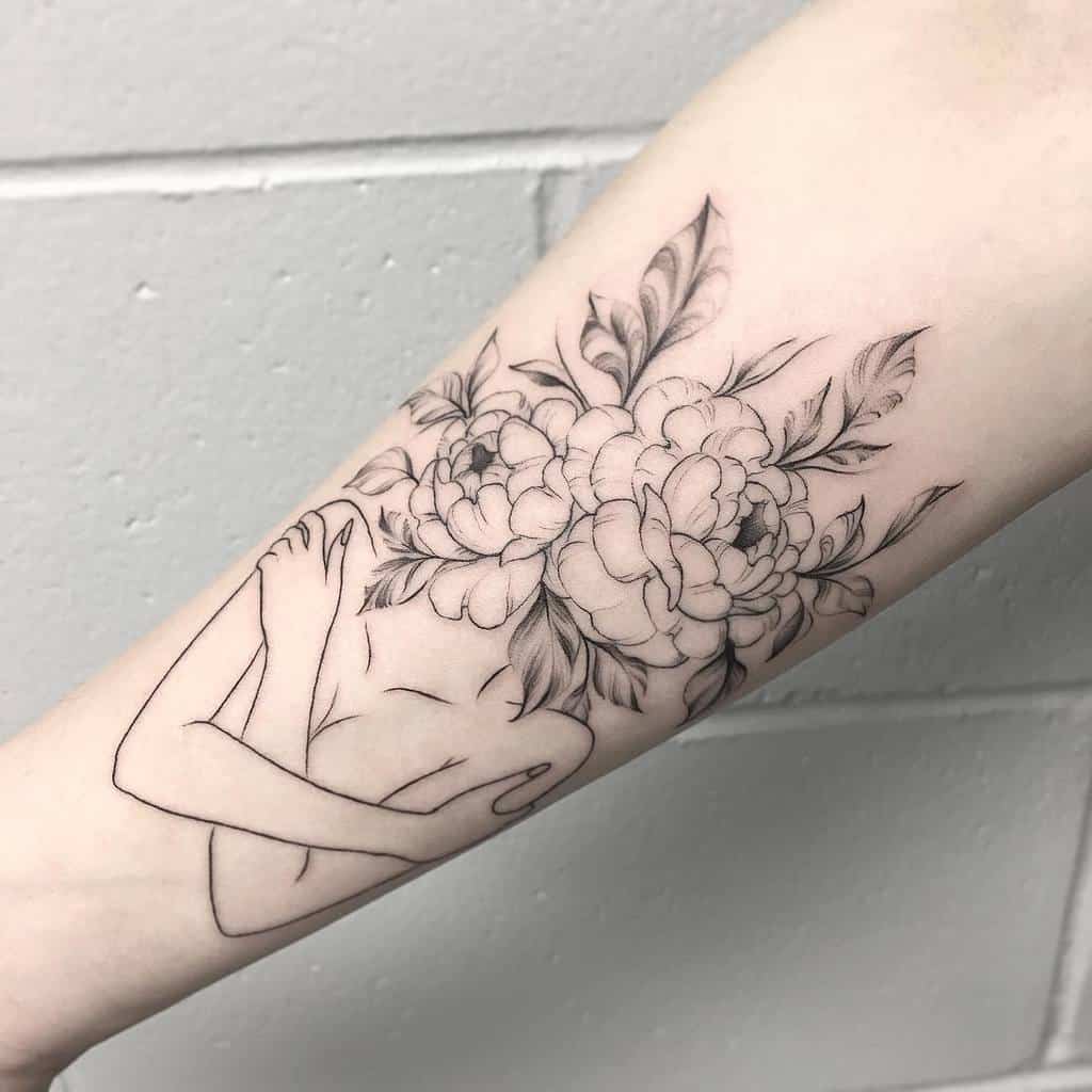 A tattoo of a person with a flower bouquet for a head on an arm