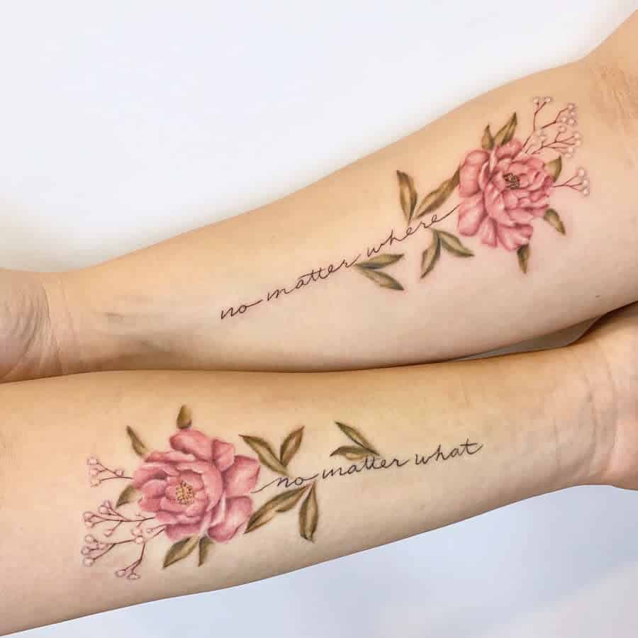 Two forearm tattoos with pink flowers and script text reading "no matter where, no matter what"