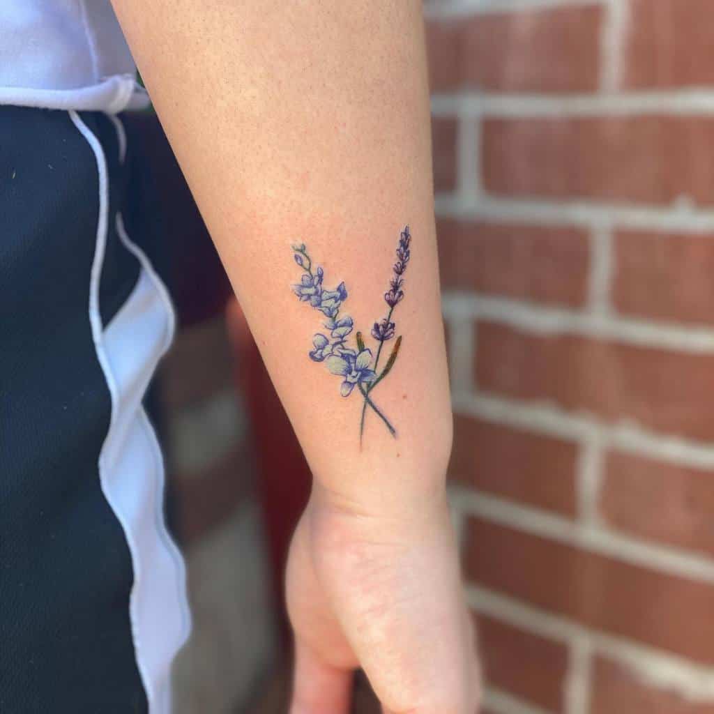 A delicate lavender tattoo on a wrist