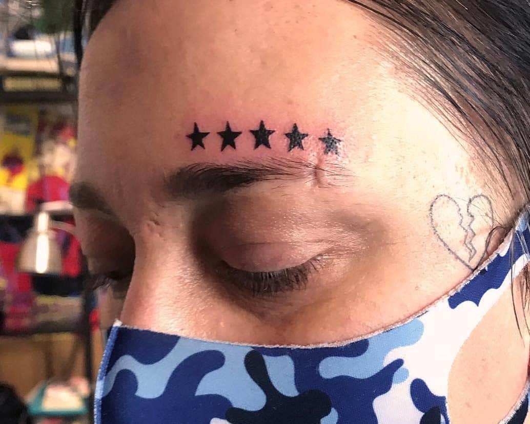 Small Forehead Tattoos
