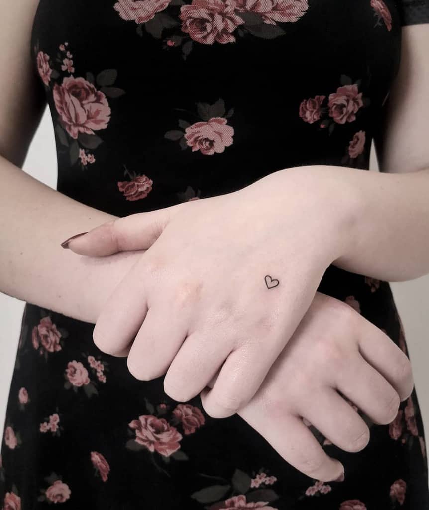 Small heart tattoo on the hand