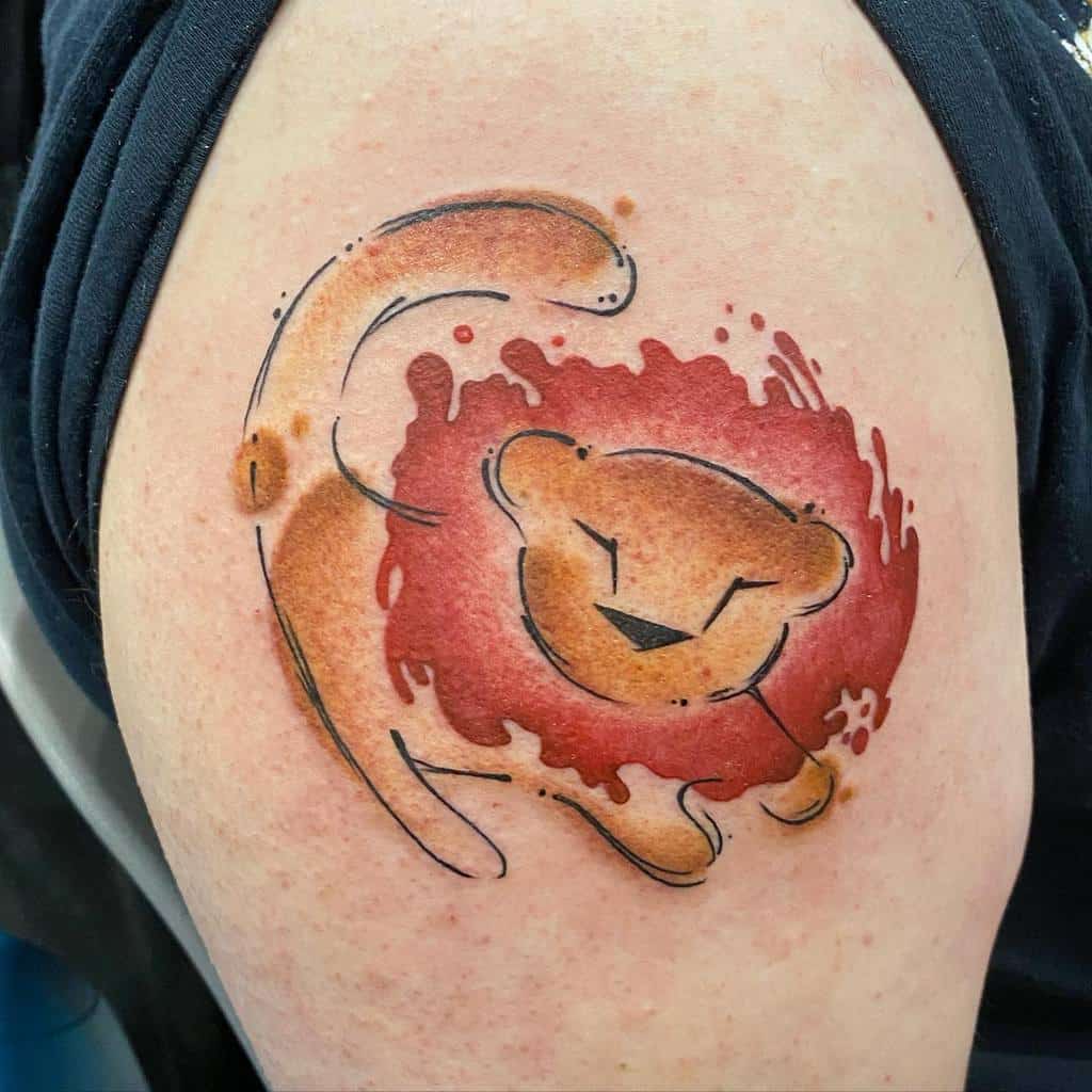 A minimalist lion tattoo with an abstract red mane on the upper arm