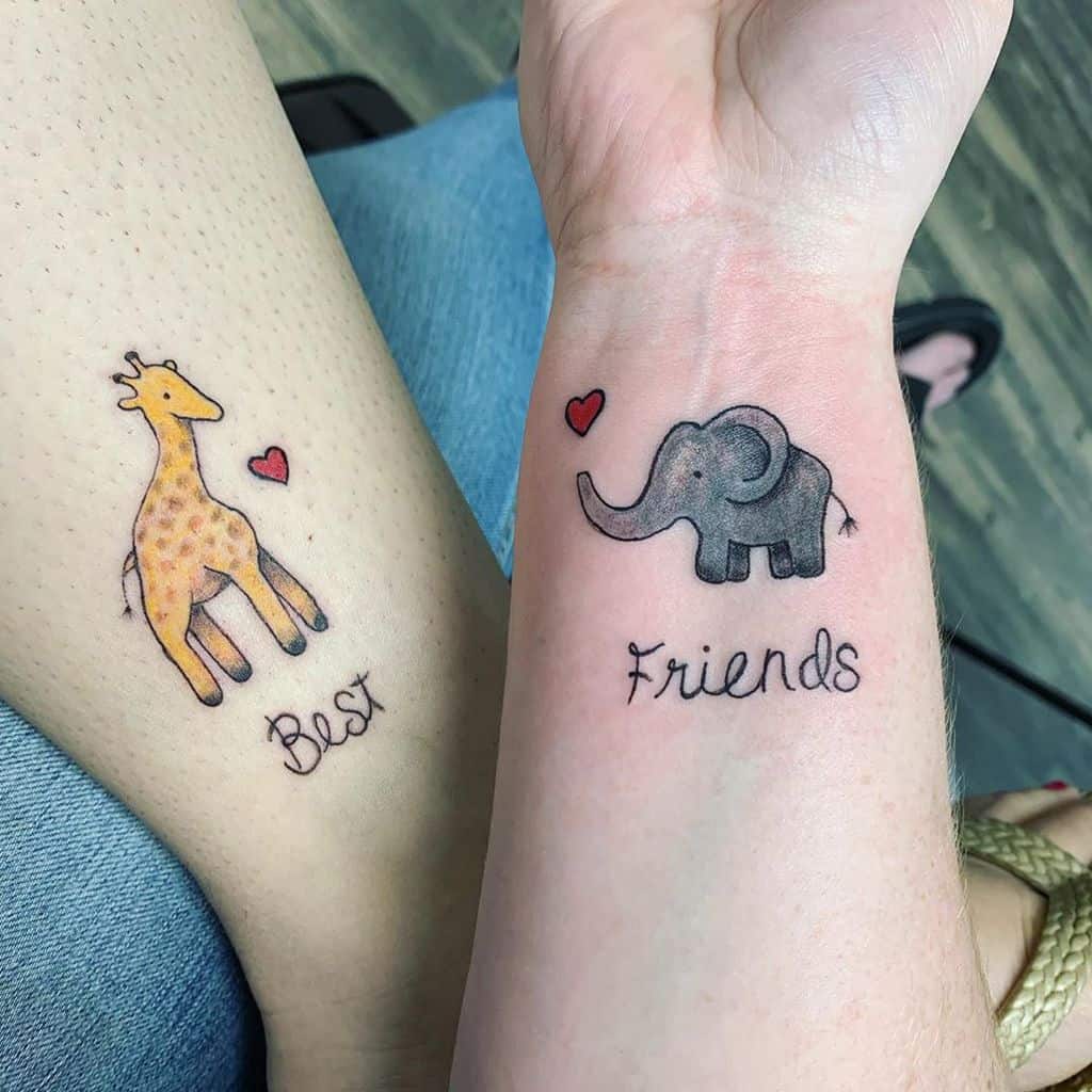 Close-up of two tattoos: a giraffe with "Best" and an elephant with "Friends," both with small red hearts